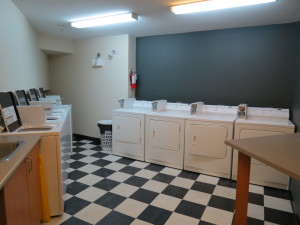 Apartment with laundry facility - Signature Club Suites